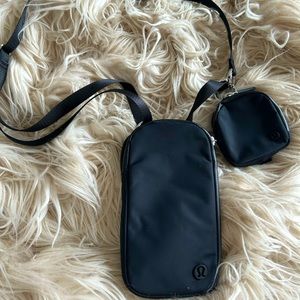 Lululemon Black cross body mini bag with attached small pouch